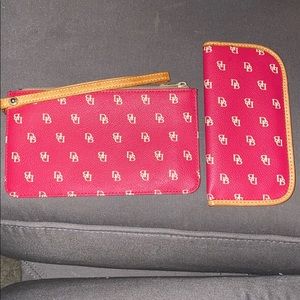 Dooney and Burke wristlet and glasses case.